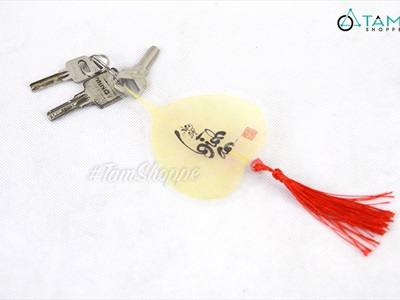 Dây treo lá bồ đề vàng chữ thư pháp PKT-TET-01